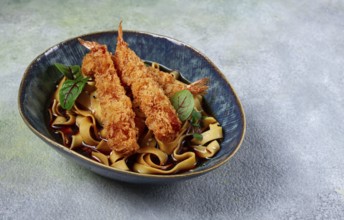 Udon noodles with shrimp in tempura, Japanese cuisine, homemade, no people