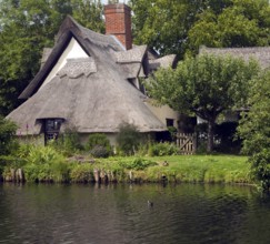 Thatched Bridge Cottage at Flatford, East Bergholt, Suffolk, England, United Kingdom, Europe