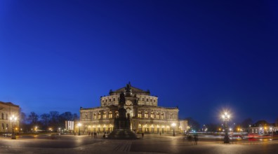 Semperoper am Theaterplatz with King Johann monument in the evening, Dresden, Saxony, Germany,