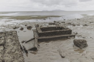 Graves near the settlement of Togoru flooded by rising sea levels, 07.05.2024. Bärbock is