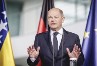 Olaf Scholz, Federal Chancellor, speaks at a press conference during the visit of the Chairman of