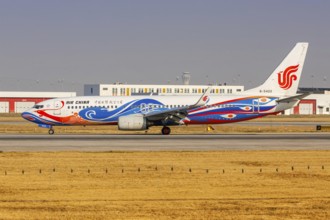 An Air China Boeing 737-800 aircraft with the registration number B-5422 and the Phoenix special