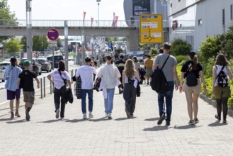 Adenau, Germany, 8 June 2024: Fans on their way from one of the Rock am Ring campsites to the