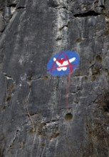 Steep rock face made of mass limestone with painting, Hönnetal, Balve, Sauerland, North