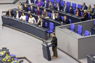 Volodymyr Zelensky (President of Ukraine) delivers a speech at a special session of the German