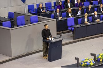 Volodymyr Zelensky (President of Ukraine) delivers a speech at a special session of the German