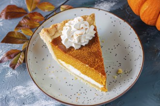 Single slice of pumpkin pie with cream on plate. Generative Ai, AI generated