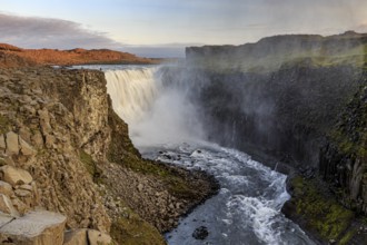 Large waterfall in a gorge, spray, rapids, summer, midnight sun, Dettifoss, North Iceland, Iceland,