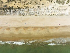 Beach life at the Asperillo cliff, the highest dune cliff in Europe. At the Atlantic Ocean near