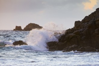 Waves breaking on the rocky coast near Plouarzel on the Atlantic coast, Département Finistère,