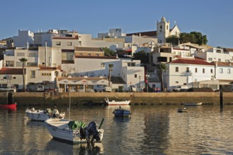 Ferragudo and Rio Arade Bay in the evening light, Algarve, Portugal, Europe