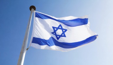 Flag, the national flag of Israel fluttering in the wind