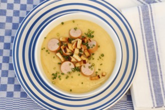 Swabian cuisine, potato soup with string sausages and pretzel croutons, hearty, savoury, typical