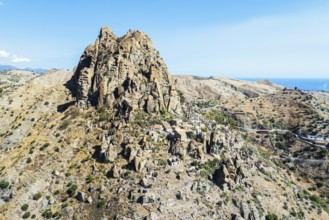 Mountains and Olive groves around Ghost Town from a drone, Pentedattilo Village, Calabria, Italy,