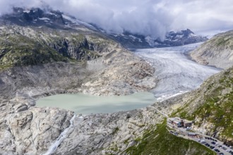 Drone shot of melting Rhone glacier, glacial lake, origin of Rhone river, Switzerland, Europe