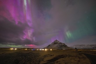 Northern lights over mountain in Arnarstapi, Snäfellsnes peninsula, Snæfellsnes, West Iceland,