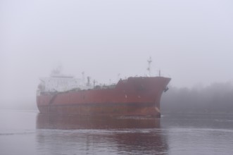 Tanker JAZZ sailing in fog in the Kiel Canal, Kiel Canal, NOK, Schleswig-Holstein, Germany, Europe