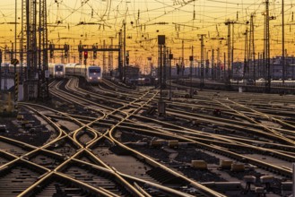 Track apron with trains, rails, points, pylons and signalling systems. Infrastructure at the main