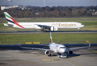 Emirates Boeing 777 aircraft after landing at Düsseldorf Airport, main runway 05R/23L, South, DUS,