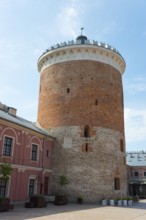 High brick tower in the courtyard of a historic building, watchtower, castle, museum, Lublin,