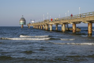 Tourists on the Vineta Bridge, pier with diving gondola, Zinnowitz, Usedom Island, Baltic Sea,