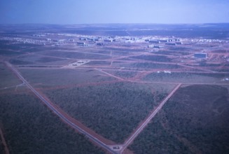 Aerial view of buildings, street network and city map, Brasilia, Federal District, Brazil, 1962,