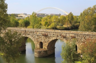 Modern bridge behind Puente Romano, Roman bridge crossing, Rio Guadiana River, Merida, Extremadura,