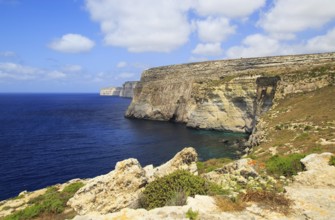 Coastal clifftop landscape view westwards at Ta' Cenc cliffs, island of Gozo, Malta, Europe