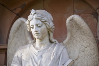 White, female angel figure, angel statue with star on the crown, detailed view with finely worked