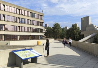 Antony Gormley human figure sculpture on rooftop, campus of University of East Anglia, Norwich,