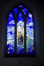 The stained glass east window by Surinder Warboys 1990, St Peter church, Chillesford, Suffolk,