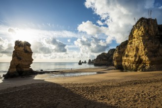 Colourful cliffs and sunrise on the beach, Praia da Dona Ana, Lagos, Algarve, Portugal, Europe