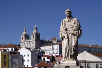 View from the viewpoint Miradouro de Santa Luzia, São Vicente statue, church Igreja de Santo