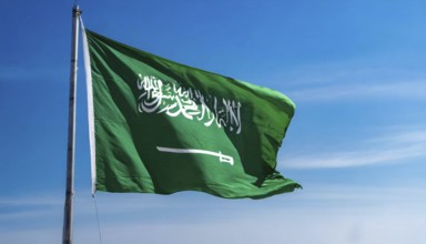 Flag, the national flag of Saudi Arabia flutters in the wind