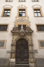 Entrance portal with the alegories of Faith and Peace from the Baroque town hall from 1661,