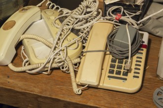 Old analog dial tone telephone and answering machine, Quebec, Canada, North America