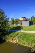 Graduation tower, graduation building, salt works, with modern sculpture round fountain, Steinhof,