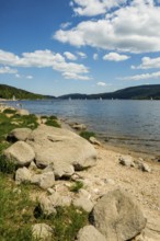 Lake in the mountains and beach in summer, Schluchsee, Black Forest, Baden-Württemberg, Germany,