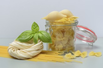 Various types of pasta with glass container, pasta varieties