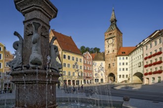 Medieval gate tower, Schmalzturm town gate or beautiful tower, baroque sculptures as gargoyles,