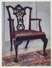 Furniture around the turn of the century 1900, Mahogany arm-chair in the Chippendale style (1910,