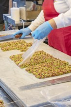 Person making traditional nougat, Ortygia, Syracuse, Sicily, Italy, Europe