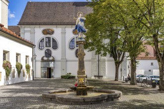 Fountain on the church square in Dillingen an der Donau, Bavaria, Germany, Europe