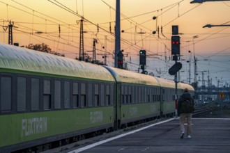 Flixtrain train arriving at Essen central station, dusk, North Rhine-Westphalia, Germany, Europe