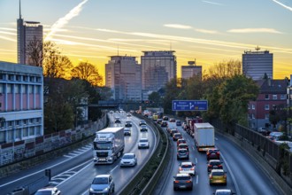 Evening traffic, partly with traffic jams, slow-moving traffic on the A40 motorway, skyline of