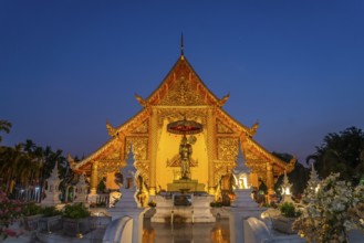 The Buddhist temple complex of Wat Phra Singh at dusk, Chiang Mai, Thailand, Asia