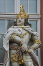 Sculpture of a Roman emperor with golden crown and cross, golden, view, detail, ancient king, Zum