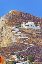 View of Panagia Kimissis church built on a cliff above the sea, Chora, Folegandros Island, Cyclades