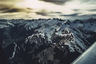 Flight over the late winter Lech Valley with a small aeroplane in Tyrol, Austria, Europe