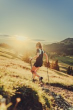 Summer trail running and hiking in the Alps on the Riedberg Pass between Obermaiselstein and